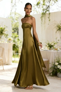 Close-up of olive green satin backless maxi dress with matching neck scarf detail