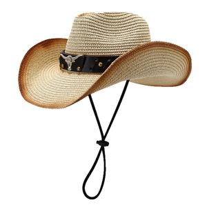 Western straw cowboy hat with metallic bull head decor and adjustable chin strap