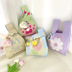Cute knitted handbags with floral patterns and bird embroidery in various vibrant colors