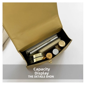 Internal view of yellow chain bag showing capacity for phone, lipstick, and cosmetics