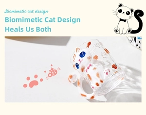 Close-up of 3D orange cat glass mug with creative cat tail handle and fish prints