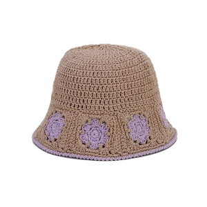 Japanese hollow-out crochet bucket hat with purple floral accents for summer travel