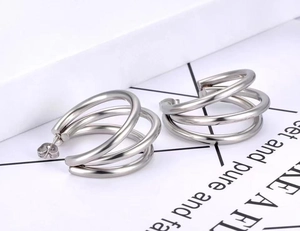 Minimalist silver triple-layered hoop earrings in geometric C-shape stainless steel