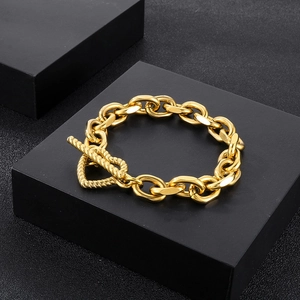 Polished gold stainless steel link bracelet featuring a unique heart T-bar toggle clasp closure