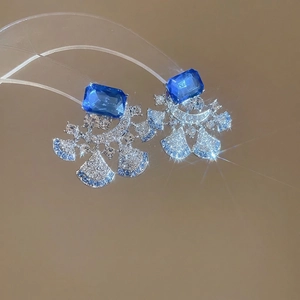 Luxury floral drop earrings with blue square crystals and sparkling silver accents