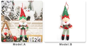 Detail view of gnome elf ornaments with sequins and long legs on a Christmas tree
