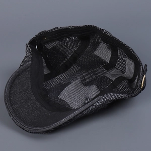 Detail view of denim ivy cap with breathable mesh lining and metallic side adjustment