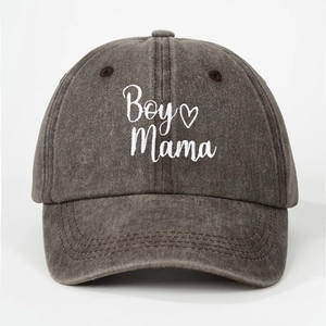 Detailed close-up of white Boy Mama embroidery on charcoal grey washed baseball cap