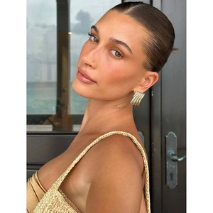 Chic 18K gold plated stainless steel earrings with unique ribbed wave texture