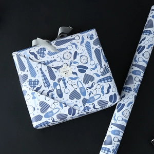 Blue and white Father's Day gift wrapping paper rolls with classic gentleman patterns