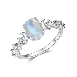 Vintage moonstone star and moon ring in 925 silver with a blue glow sun moon design