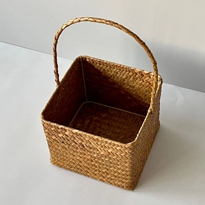 Handwoven square seagrass basket with sturdy handle for gift and flower arrangements