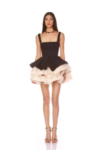 Front full view of black square neck mini dress with beige ruffled layered tutu skirt