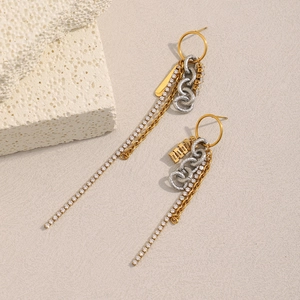 Close-up of 18K gold plated tassel earrings with sparkling rhinestones and chains