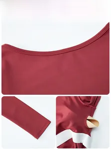 Detail of wine red yoga bodysuit featuring double-stitched neckline and white elastic bands