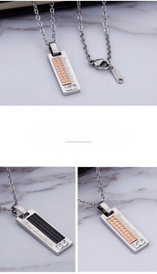 Detail of square zircon inlay and Love Devotion engraving on couple necklaces