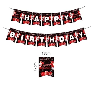 Detail of 13th birthday party banner with red and black Happy Birthday letter flags