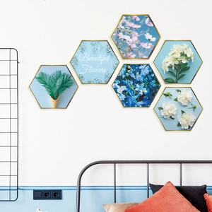 Modern hexagon wall stickers featuring fresh green plants and flowers in golden frames