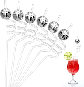 Close-up of spiral party straws with reflective disco ball toppers in a glass