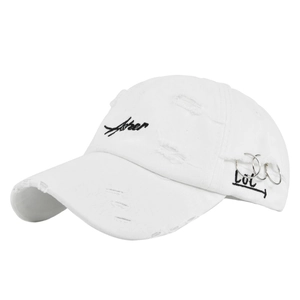 Close-up of distressed white baseball cap with Asher embroidery and silver metal rings