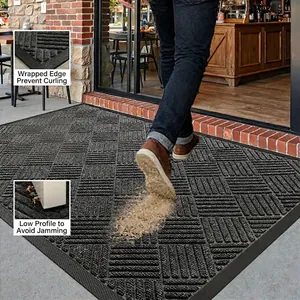 Non-slip grey door mat with geometric texture for scraping dirt and low-profile design