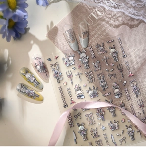 Detail of Gothic Lolita rabbit nail stickers with cross and lace designs for dark style