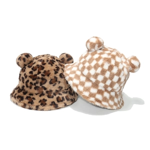 Plush bucket hats with bear ears featuring leopard print and checkerboard patterns