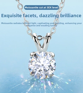Detailed macro shot of 1 carat moissanite pendant with classic four-prong setting