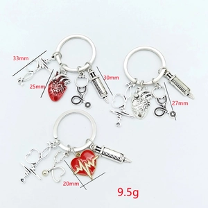 Set of medical keychains with heart and stethoscope charms and detailed measurements