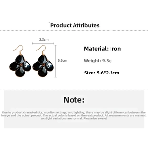 Detailed view of layered teardrop earrings with dimensions 5.6x2.3cm and 9.3g weight