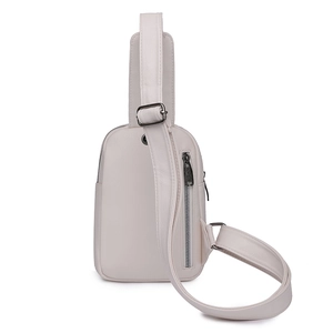 Minimalist white PU leather crossbody chest bag with adjustable strap and side zipper pocket