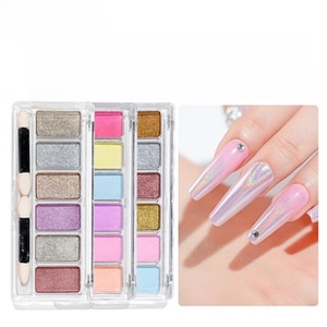 Detailed view of 6-color solid nail powder palette with gold, silver and pearl pigments
