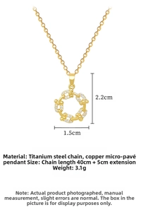 Detail of gold titanium steel necklace with 40+5cm chain and cubic zirconia pendant