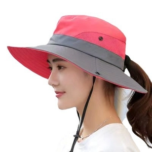 Women's pink wide brim sun hat with ponytail hole and breathable mesh for hiking