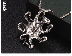 Macro shot of punk octopus pendant back side with detailed silver tentacle textures