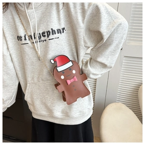 Cute gingerbread man crossbody bag with red Santa hat and gold chain strap for Christmas