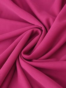Close-up of vibrant rose pink mesh fabric texture for the strapless fashion dress