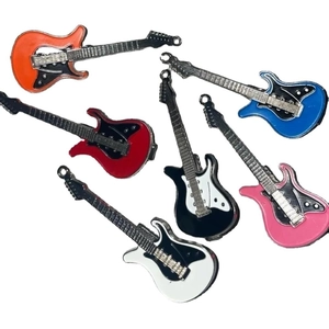 Set of six colorful Y2K guitar hair clips in orange, red, blue, black, pink, and white