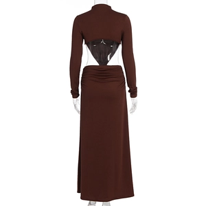 Detail view of the back diamond cutout design on this brown slim fit backless maxi dress