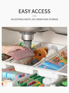 Adjustable white under-sink storage rack with DIY expandable tiers and slide-out baskets