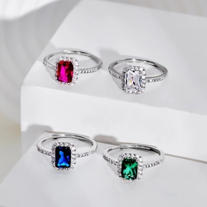 S925 sterling silver rings with colorful rectangle zircon stones on white podiums
