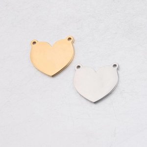 Close-up of heart-shaped stainless steel pendant connectors in gold and silver finish