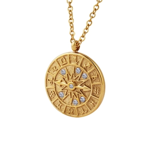 Gold celestial zodiac compass pendant necklace featuring sparkling zircon inlay details
