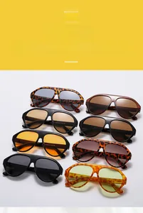Detailed display of oversized aviator sunglasses in leopard print and various colors