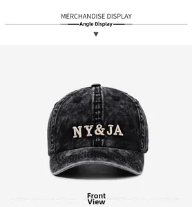 Detailed front view of washed black denim baseball cap with NY and JA embroidery