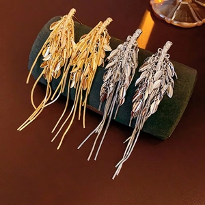 Golden and silver metal leaf tassel earrings with sleek snake chain drop fringe