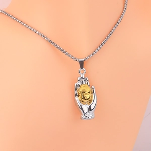 Silver square box chain necklace featuring a hand pendant holding a gold Buddha head