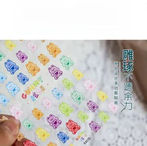 Detailed close-up of colorful translucent gummy bear nail stickers with heart details