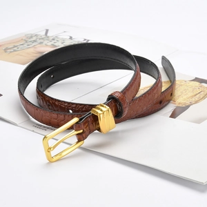 Women's thin crocodile pattern leather belt with golden pin buckle in caramel brown