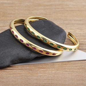 18k gold plated adjustable C-shape bangle set with red and green oval cubic zirconia stones